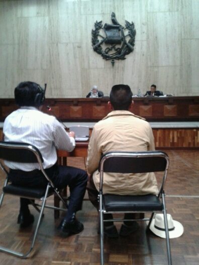 Witness Domingo Santiago Cedillo sits before the court accompanied by an interpreter but he chose to give his testimony in Spanish, interrupted only by tears.