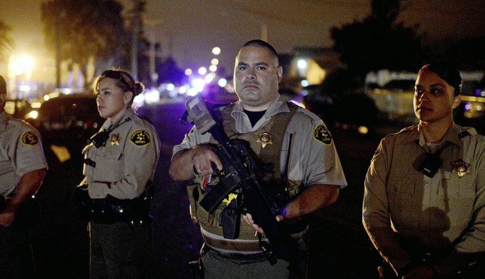 Sheriffs respond to community protest in East Salinas, assault rifles ready.