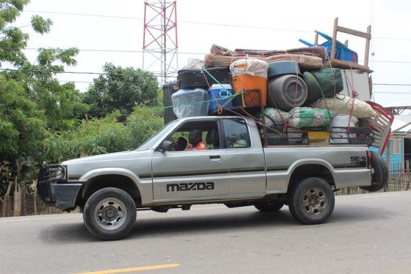 this man's business is trsnaporting goods of haitians self-deporting from DR