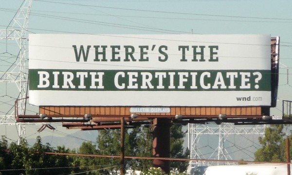 A billboard asking President Obama to publish his birth certificate (Credit: Victor Victoria/Flickr)
