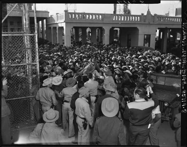 "Mexican workers await legal employment in the United State," Mexicali, 1954 (Public Domain)