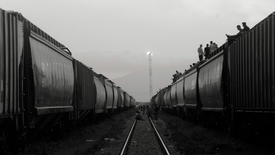 Migrants kill time in southern Mexico as they wait for the trains to depart. (Peter Haden/Flickr)