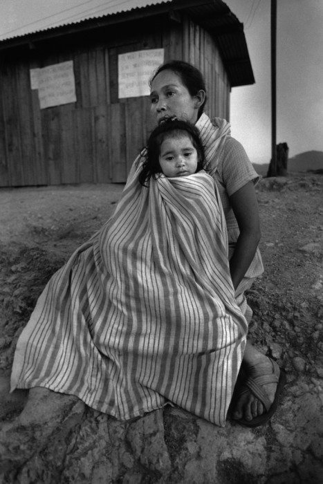  Salvadoran mother and child at a refugee camp in Honduras in 1988 (Moody College of Communication/Flickr)