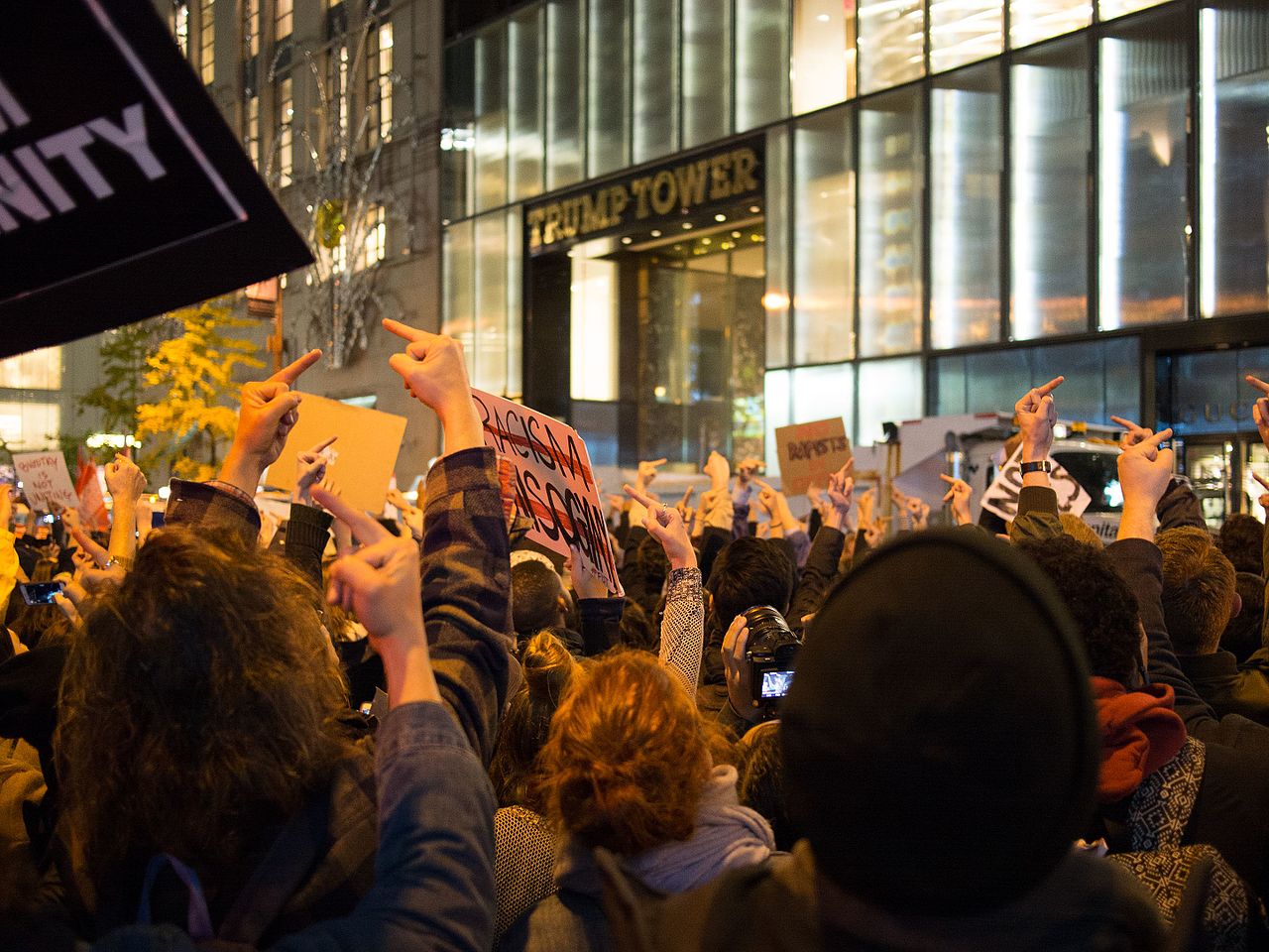 Protesters in Manhattan flip their middle fingers against the presidency of Donald Trump on November 9, 2016. (Photo by Rhododendrites/Wikimedia Commons)